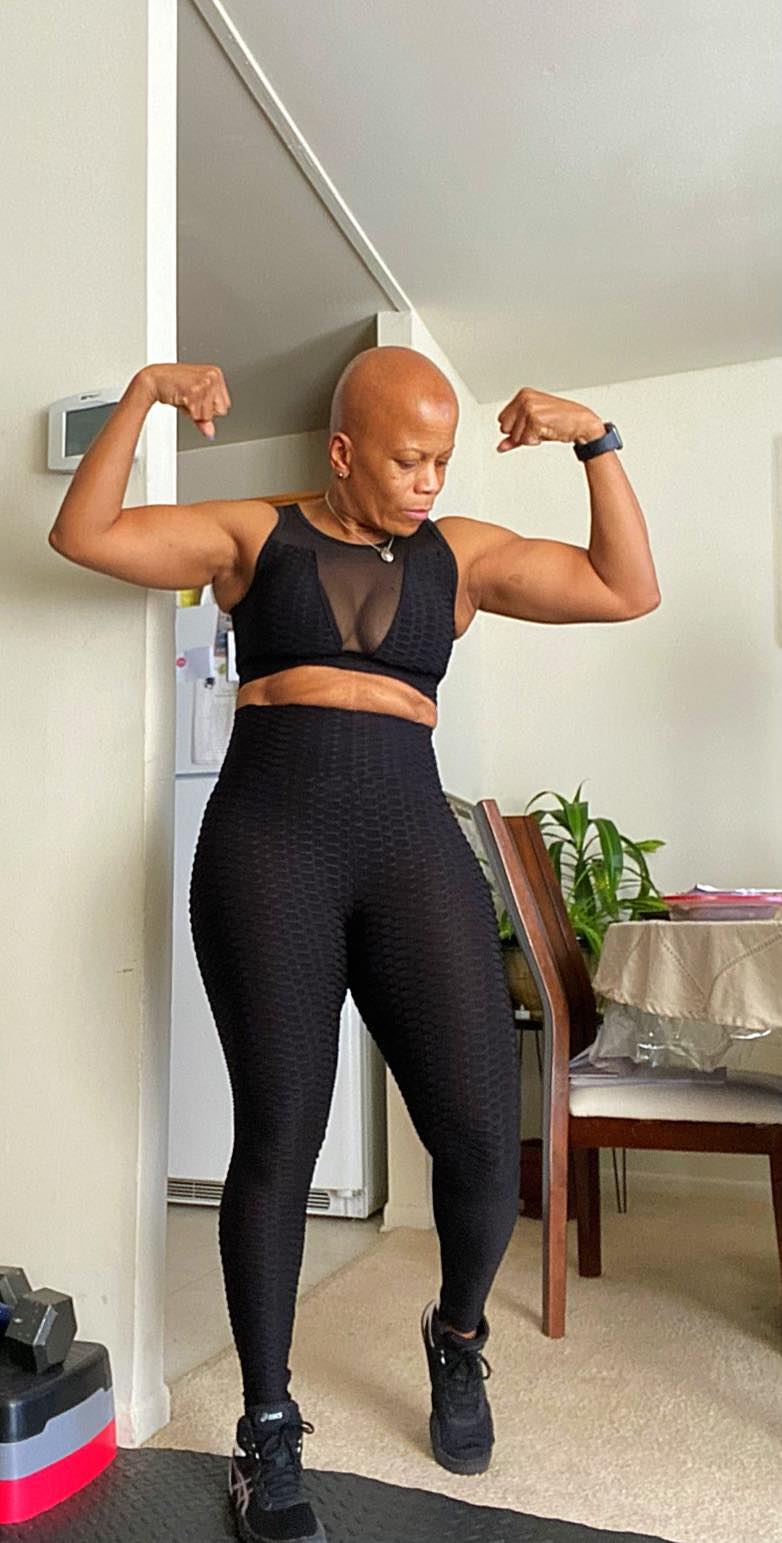 Female Body Builder Flexing her muscle